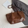 Chic brown leather tote bag for women featuring long handles and vintage minimalist style - Without Pendant / Brown