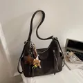 Dark brown wasteland style faux leather underarm bag with star and bear charms - Black With Pendant