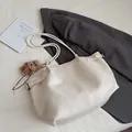 Minimalist cream white PU leather tote bag with bear charm and long straps for women - With Pendant / White