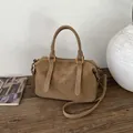 Minimalist khaki suede crossbody bag with gold logo and stylish shoulder strap - No Pendant / Brown