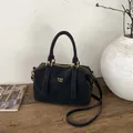Minimalist black suede Boston handbag with gold logo and detachable shoulder strap - No Pendant / Black