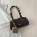Dark grey suede shoulder bag with contrast stitching and brown plush dog charm accessory - With Ornament / Brown