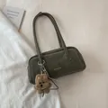 Vintage sage green shoulder bag with white contrast stitching and a plush bear charm - With Ornament / Green