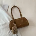 Brown leather underarm shoulder bag with golden lettering and cute puppy pendant - With Ornament / Brown