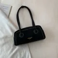 Black vintage shoulder bag with contrast white stitching and gold lettering detail - Without Ornament / Black