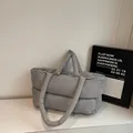 Minimalist quilted puffer tote bag in grey matte nylon with spacious shoulder straps - Gray