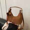 Brown suede crescent bag with pompom tassel and detachable strap for shoulder use - Brown with Pendant