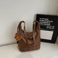 Vintage brown hobo shoulder bag with white stitching and cute plush bear charm - With Ornament / Brown