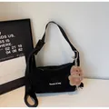 Black stylish tote bag with Banatu letter print and a cute brown bear pendant charm - Black with Pendant