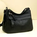 Sac bandoulière chic en cuir PU noir pour femme avec motif matelassé et breloque kangourou - Noir
