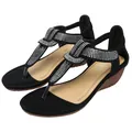 Women's black wedge sandals featuring shimmering silver rhinestones and T-strap design - EU 40 / Black