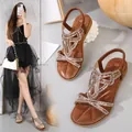 Brown bohemian flat sandals for women featuring white rhinestones and elastic back strap - EU 35 / Camel