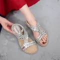 Silver flat sandals with crystal flower embellishments and elastic heel strap - 35 / Silver