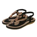 Women bohemian flat sandals with ethnic beads and elastic strap in black and brown - EU 36 / Black