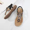 Bohemian black sandals featuring rhinestone flower patterns and beaded details - EU 36 / Black
