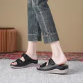 Women's black wedge sandals with decorative stitching and adjustable straps - 38 / Black