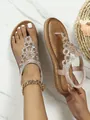 Böhmische flache Sandalen in Roségold mit funkelnden Strasssteinen und Blumendetails - Rosa