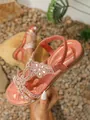 Women's rose gold flat sandals with rhinestone flower detail and elastic heel strap - Orange