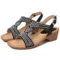 Black bohemian wedge sandals for women with sparkling rhinestone heart charms - EU 36 / Black
