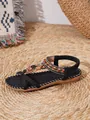 Detail view of Bohemian flat sandals with ethnic beads, embroidery, and wooden butterfly - 38 / Black (AAA-2AA)
