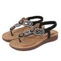 Böhmische flache Sandalen für Damen mit funkelnden Strasssteinen und Blumenperlen in Schwarz - Schwarz
