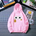 Detail of pink hoodie with cartoon eye print featuring kangaroo pocket and ribbed cuffs - S / Hot Pink