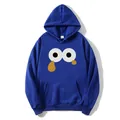 Detail of royal blue hooded sweatshirt featuring cartoon eyes graphic and kangaroo pocket - S / Dark Blue