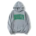 Women's light grey oversized hoodie with green Brooklyn print and front pouch pocket - S / Gray