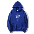 Close-up of royal blue hoodie featuring a white butterfly print and kangaroo pocket detail - Dark Blue