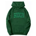 Detail of Brooklyn print on dark green oversized hoodie with a front kangaroo pocket - Dark Green