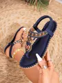 Donkerblauwe Bohemian platte sandalen met borduursel en een vlinder hanger detail - Marineblauw