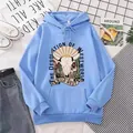 Close-up of light blue hoodie featuring vintage wild west bull skull and cactus print - S / Sky Blue
