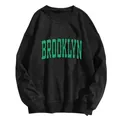 Loose black crewneck sweatshirt with vintage green Brooklyn letter print and ribbed cuffs - Black