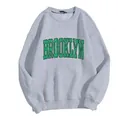 Detail of grey crewneck sweatshirt featuring vintage Brooklyn letter print and ribbed cuffs - Gray
