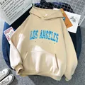 Detail of Los Angeles print on oversized beige hoodie with kangaroo pocket and drawstrings - S / Apricot