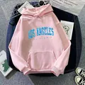 Detailed view of pink hoodie with blue Los Angeles text print and ribbed cuffs - S / Dark Pink