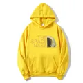 Sweat à capuche jaune NASA avec motif astronaute et poche kangourou confortable - S / Jaune