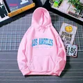 Flat lay detail of pink Los Angeles hoodie featuring kangaroo pocket and drawstring hood - S / Hot Pink