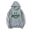 Détail d'un sweat à capuche gris montrant l'imprimé smile vert et l'étiquette de taille L - S / Gris