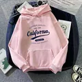 Detailed close-up of pink oversized hoodie with California print and kangaroo pocket - Dark Pink