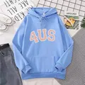 Flat lay of a light blue oversized 4US hoodie with denim jeans and casual sneakers - S / Sky Blue