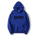 Detail of navy blue hoodie featuring SHHH NO ONE CARES slogan print and kangaroo pocket - Dark Blue