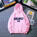 Close-up of pink oversized hoodie featuring navy AMLBFLY lettering and ribbed cuffs - Hot Pink