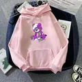Detail of pink oversized hoodie featuring a purple zombie bear print with street accessories - S / Dark Pink
