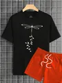 Detail view of black t-shirt with dragonfly print and orange shorts with drawstrings - S / Black T-Shirt Orange Shorts
