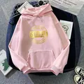 Detail of pink oversized hoodie with golden slogan print and drawstring hood detail - S / Dark Pink