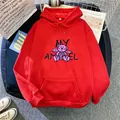 Detail of red oversized hoodie featuring angel bear graphic and kangaroo pocket - S / Red