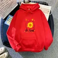 Close-up of bright red hoodie with sunflower print and Be Kind motivational text detail - S / Red