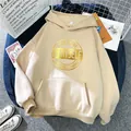 Detail of oversized beige hoodie featuring golden circle print and fleece texture - S / Apricot