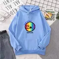 Detail of light blue hoodie featuring rainbow smiley face print and kangaroo pocket - S / Sky Blue